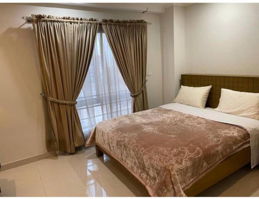 Marine Tower Apartment Равалпинди Екстериор снимка